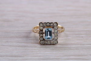 Blue Topaz and Diamond set Yellow Gold Ring