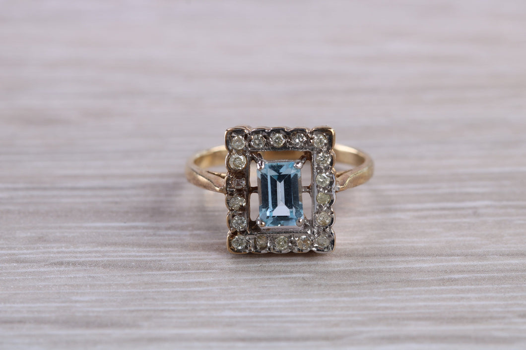 Blue Topaz and Diamond set Yellow Gold Ring
