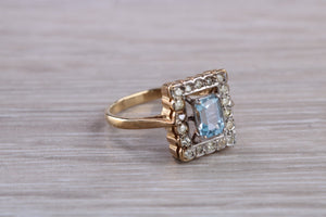 Blue Topaz and Diamond set Yellow Gold Ring