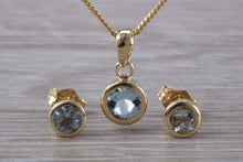 Load image into Gallery viewer, Round cut Aquamarine Matching Earrings and Necklace set in Yellow Gold