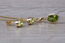 Load image into Gallery viewer, Oval cut Peridot Earrings and Matching Necklace set in Yellow Gold