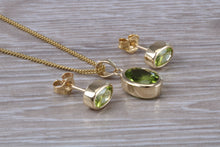 Load image into Gallery viewer, Oval cut Peridot Earrings and Matching Necklace set in Yellow Gold