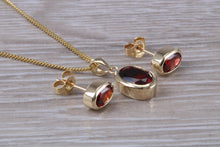 Load image into Gallery viewer, Oval cut Garnet Earrings and Matching Necklace set in Yellow Gold