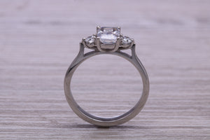 Emerald and Round cut Moissanite Diamonds set Trilogy Ring