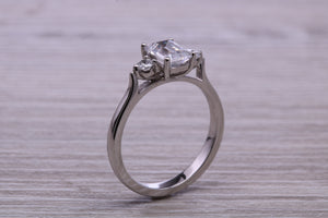 Emerald and Round cut Moissanite Diamonds set Trilogy Ring
