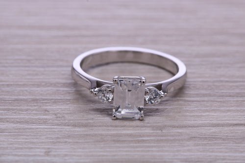 Emerald and Round cut Moissanite Diamonds set Trilogy Ring