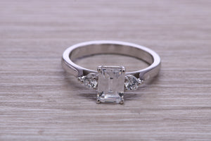 Emerald and Round cut Moissanite Diamonds set Trilogy Ring