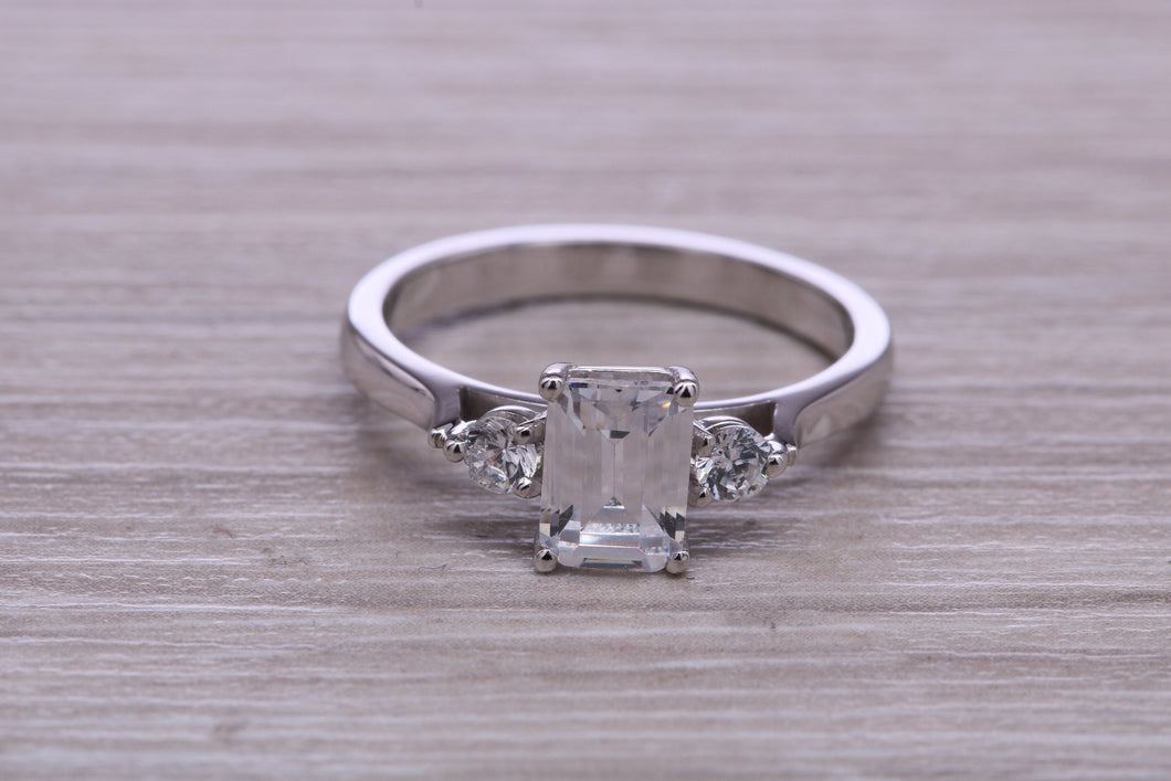 Emerald and Round cut Moissanite Diamonds set Trilogy Ring