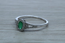 Load image into Gallery viewer, Emerald and Diamond Halo Ring