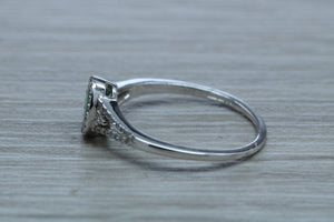 Emerald and Diamond Halo Ring