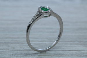 Emerald and Diamond Halo Ring