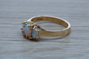 Fiery Opal and Diamonds set Yellow Gold Ring