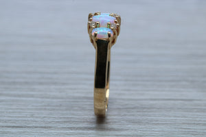 Fiery Opal and Diamonds set Yellow Gold Ring