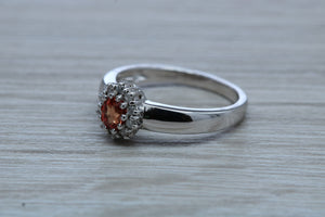 Petite Ruby and Diamond Cluster Ring