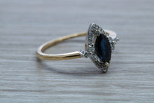 Load image into Gallery viewer, Marquise cut Halo set Blue Sapphire and Diamond Ring