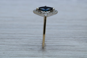 Marquise cut Halo set Blue Sapphire and Diamond Ring