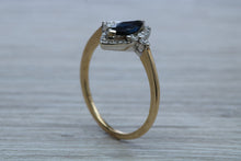 Load image into Gallery viewer, Marquise cut Halo set Blue Sapphire and Diamond Ring