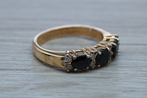 Blue Sapphire and Diamond Eternity Ring