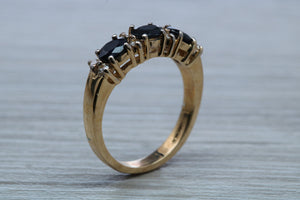 Blue Sapphire and Diamond Eternity Ring