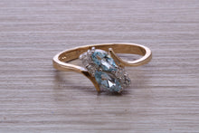 Load image into Gallery viewer, Sky Blue Topaz and Diamond set Yellow Gold Ring