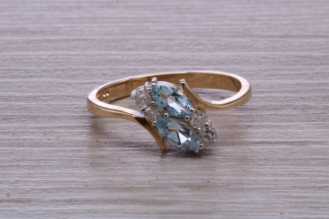 Sky Blue Topaz and Diamond set Yellow Gold Ring