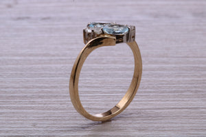 Sky Blue Topaz and Diamond set Yellow Gold Ring