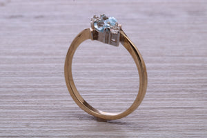 Sky Blue Topaz and Diamond set Yellow Gold Ring