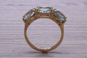 Sky Blue Topaz set Yellow Gold Twist Shank Ring