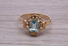 Load image into Gallery viewer, Swiss Blue Topaz set Yellow Gold Ring