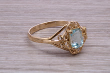 Load image into Gallery viewer, Swiss Blue Topaz set Yellow Gold Ring