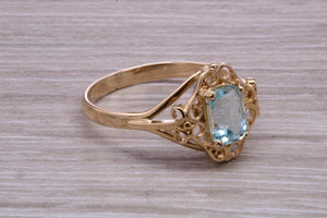 Swiss Blue Topaz set Yellow Gold Ring