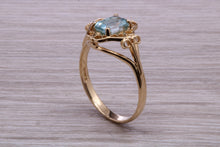 Load image into Gallery viewer, Swiss Blue Topaz set Yellow Gold Ring