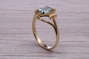 Swiss Blue Topaz set Yellow Gold Ring