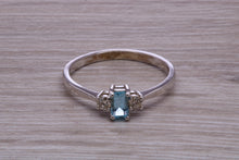 Load image into Gallery viewer, Petite Blue topaz and Diamond set White Gold Trilogy Ring
