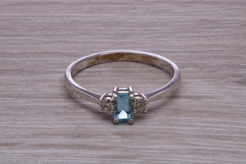 Petite Blue topaz and Diamond set White Gold Trilogy Ring