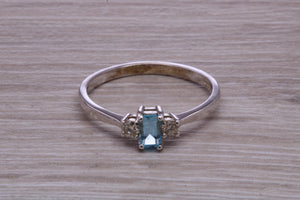 Petite Blue topaz and Diamond set White Gold Trilogy Ring