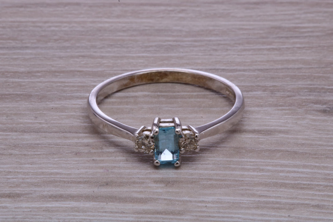Petite Blue topaz and Diamond set White Gold Trilogy Ring