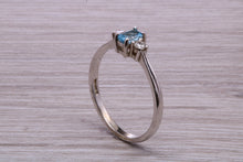 Load image into Gallery viewer, Petite Blue topaz and Diamond set White Gold Trilogy Ring