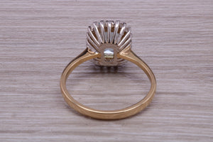 One carat Blue Topaz and Diamond set Yellow Gold Cluster Ring