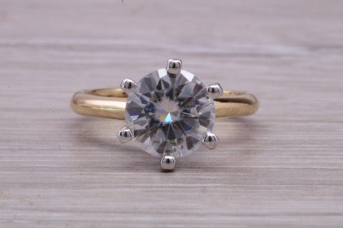 One carat Moissanite Diamond set Two Tone Gold Solitaire
