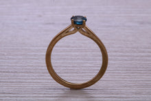 Load image into Gallery viewer, Dainty London Blue Topaz set Yellow Gold Ring