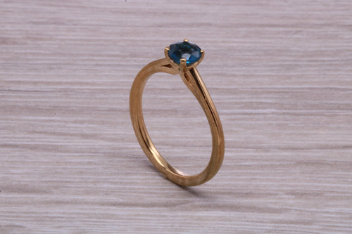 Dainty London Blue Topaz set Yellow Gold Ring