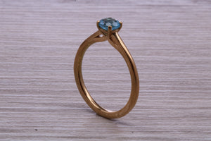 Dainty Sky Blue Topaz set Yellow Gold Ring