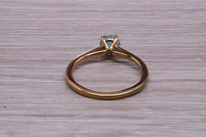 Dainty Sky Blue Topaz set Yellow Gold Ring