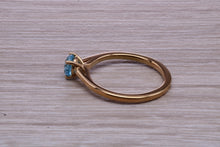 Load image into Gallery viewer, Dainty Sky Blue Topaz set Yellow Gold Ring