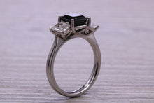 Load image into Gallery viewer, Emerald cut Blue and White Sapphire Trilogy set Platinum Ring