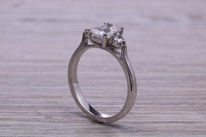 Emerald and Round cut Moissanite Diamonds set Trilogy Ring