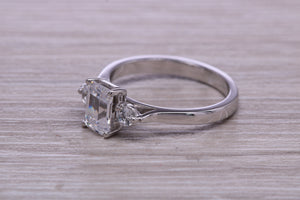 Emerald and Round cut Moissanite Diamonds set Trilogy Ring