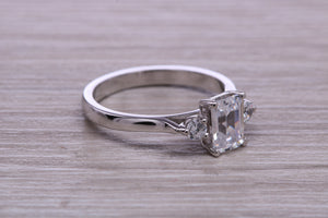 Emerald and Round cut Moissanite Diamonds set Trilogy Ring