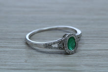 Load image into Gallery viewer, Emerald and Diamond Halo Ring